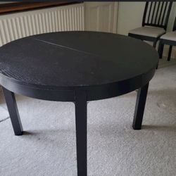 Gently used Black Dining table + 4 Chairs