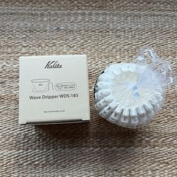 Kalita Wave Tsubame Stainless Steel Coffee Dripper 185 + Kalita Wave 185 filters.