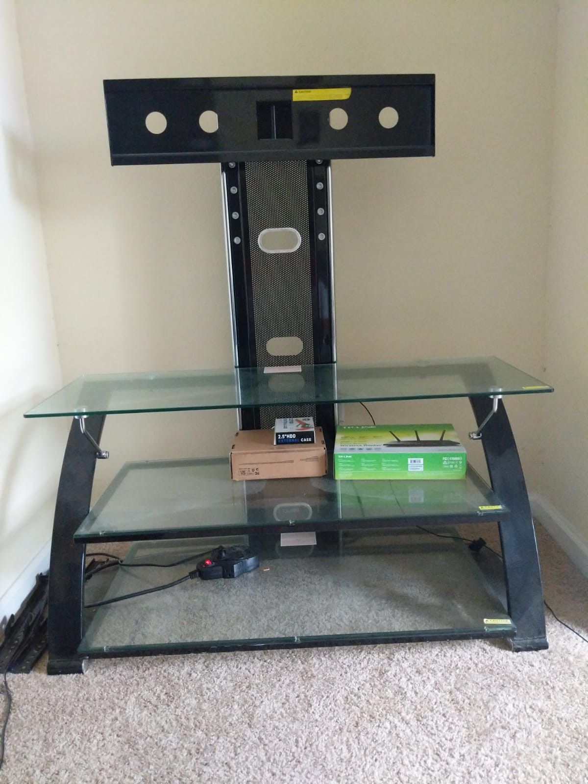 Hometrends Bayard 3-in-1 TV Stand with Mount upto 55" inch and used good in condition.