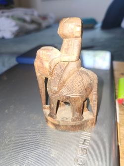 Vintage wooden elephant and rider