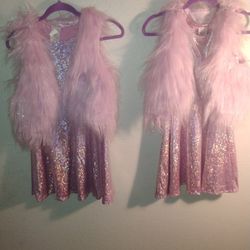 2 New Beautiful JoJo dresses from Spirit Halloween two left