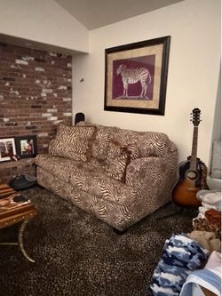 Brown zebra print couch