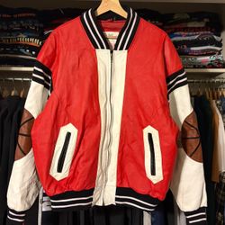 Michael Hoban “WHOMI?” leather basketball jacket.