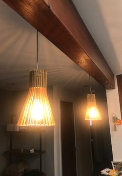 Modern wood pendants with with Edison bulbs