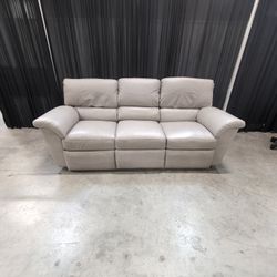 Padded Beige Reclining Three-Seat Couch in Faux Leather