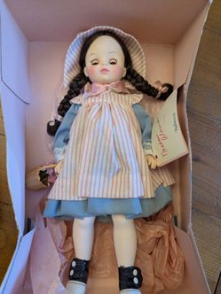 Vintage Madame Alexander Rebecca Doll. It comes with its original box (worn), and tag