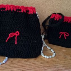 2 handmade crochet drawstring pouch bags with strap