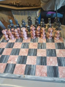 Vintage pink and black marble chess set