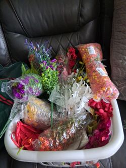Basket full of flowers (some still in new wrap)