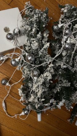 Christmas tree includes box of christmas decorations