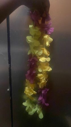 The neck wear a flower neckwear The neck wear a flower neckwear