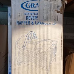 Graco Pack and play portable play yard reversible napper and change your LX Holt Fashiondark gray light gray