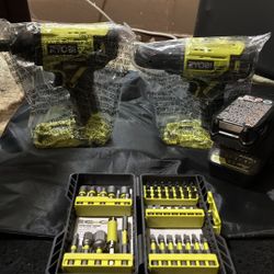 Brand New Ryobi 18v Drill  and Impact driver with bit set 