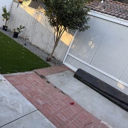 2 turf pieces rolled up