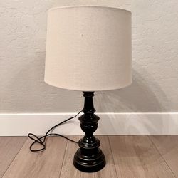 26” Tall Distressed Black Spindle Table Lamp With Beige Linen Lamp Shade