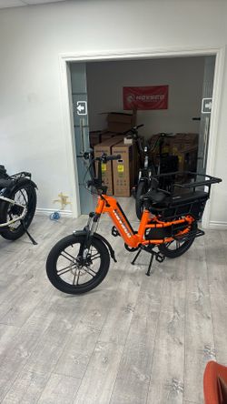 Brand new in box Grey and orange color available for 1000 total, rear basket and warranty included  Ebike for family