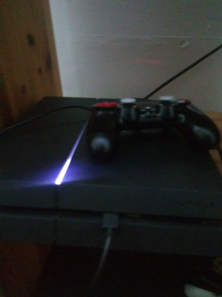 Ps4 with controller and games