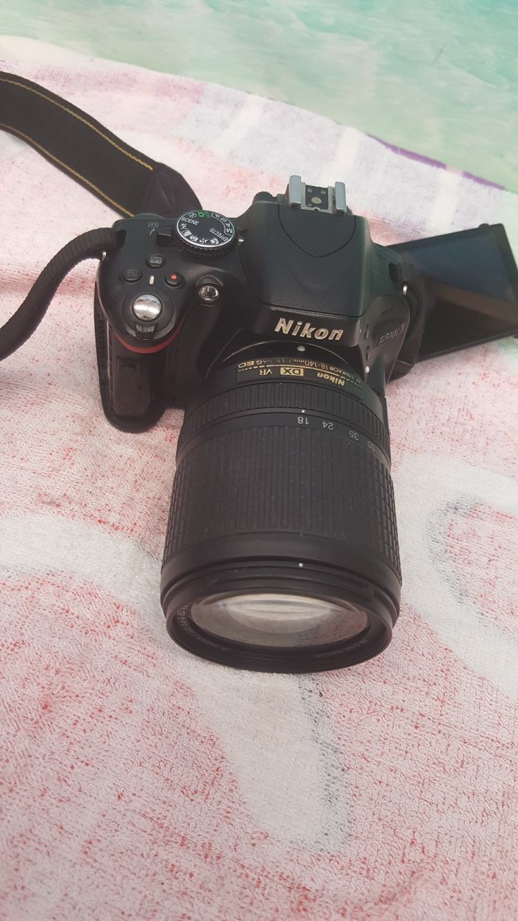 Nikon D5100 DSLR camera with 3 lenses. In good condition.