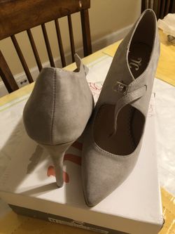New pair of ladies gray suede dress shoes