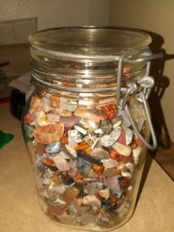 Glass of polished rocks