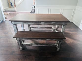 Table with bench chairs.