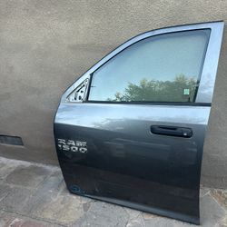 2009-2018 DODGE RAM DRIVER SIDE DOOR 