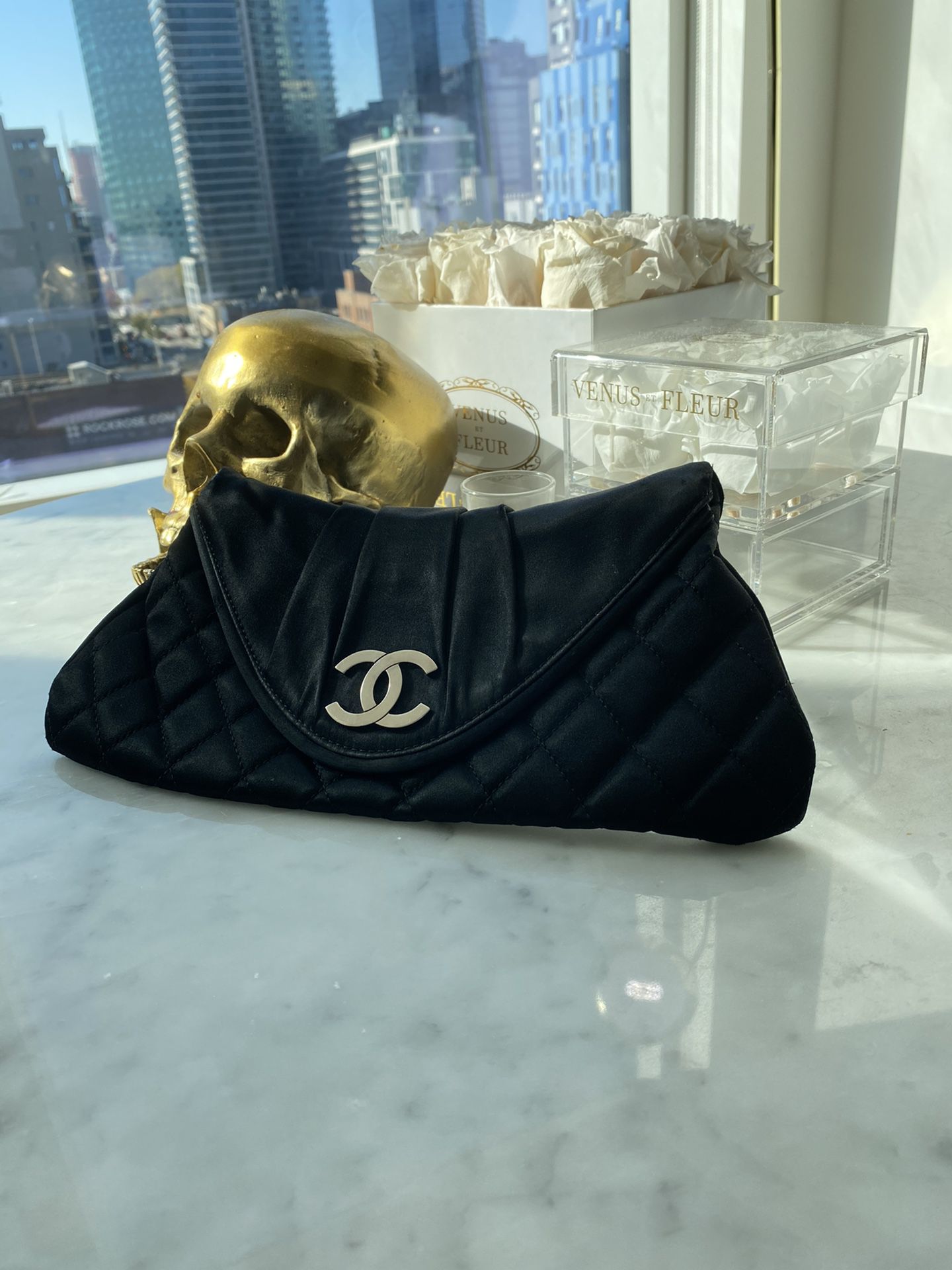 CHANEL Authentic black quilted satin bag