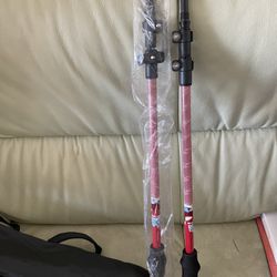 New hiking poles, made of carbon fiber, extremely lightweight, $25 per pair. Available in green, red and blue.