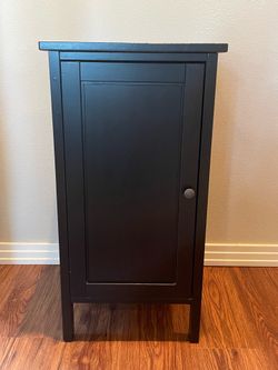 Black IKEA HEMNES nightstand