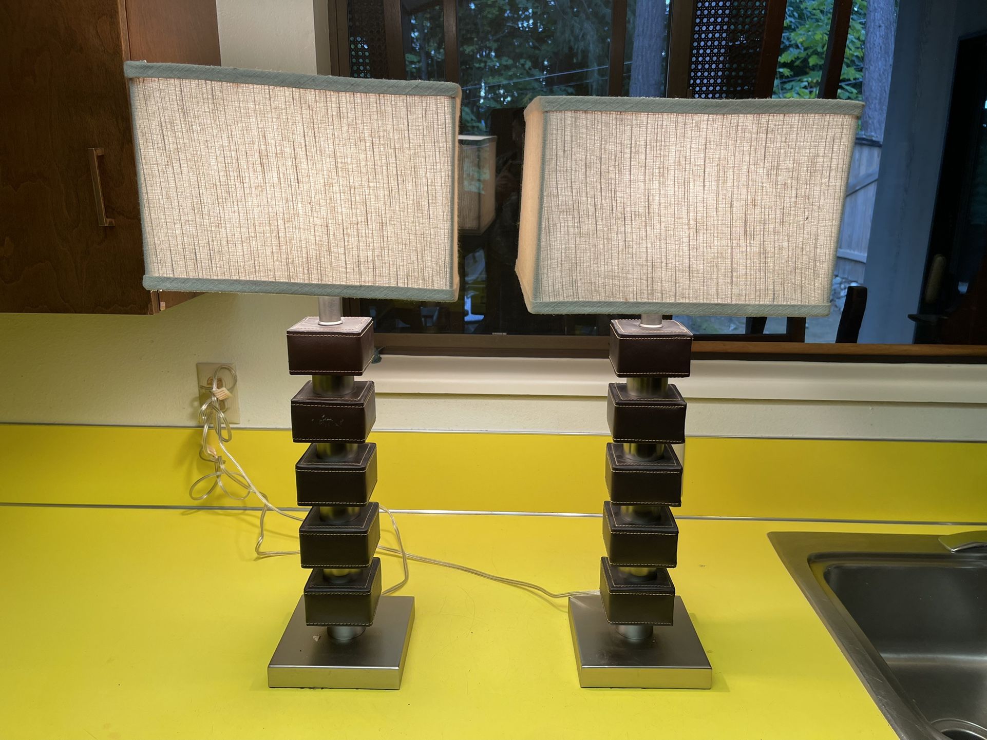 Modern leather wrapped matching lamps