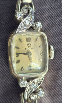 14k gold Omega watch with diamonds 1950's