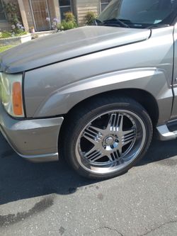 24" Wheels trade for stock Escalade wheels.