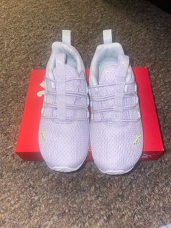 Purple toddler puma sneakers.