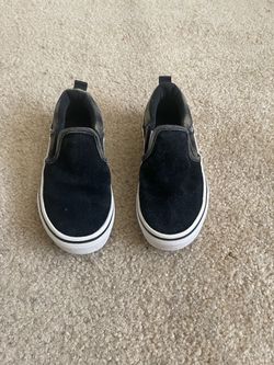 These are a pair of Youth Size 11 Vans Asher kids' slip-on shoes featuring a black suede toe.