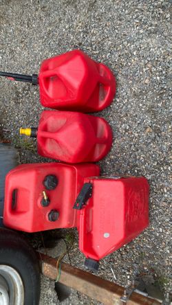 (4) 5 gal gas cans