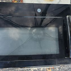 GE dishwasher and above stove microwave.