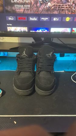 Black cat Jordan 4’s