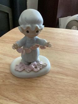 Precious Moments Porcelain Figurine with Hearts