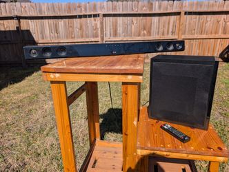 LG Soundbar And Wireless Subwoofer System