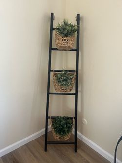 Home decor -ladder, baskets, foliage