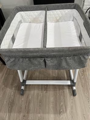 Simmons Kids By The Bed City Sleeper Bassinet for Twins - Adjustable Height Portable Crib with Wheel