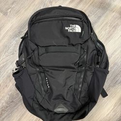 The North Face Surge Backpack And Free Cream/Ivory Backpack That Has Been Discontinued!