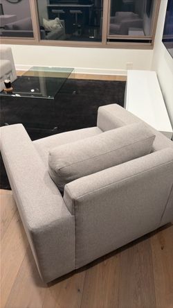 New grey West Elm swivel chair