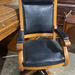 Antique Hand Carved Oak and Leather Swivel Adjustable Arm Chair
