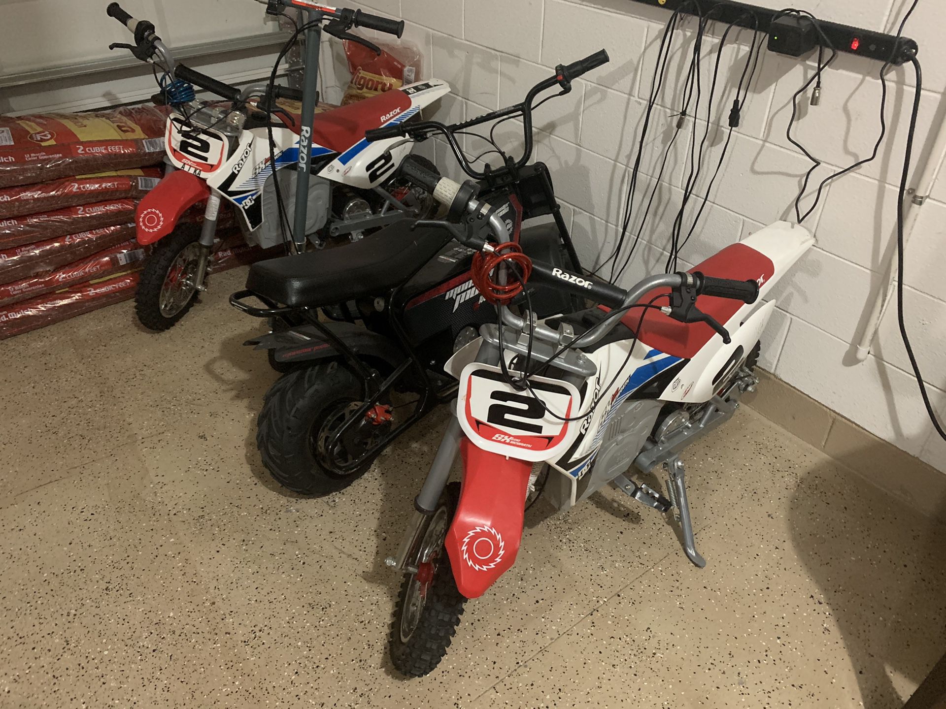 Electric dirt bikes and a scooter