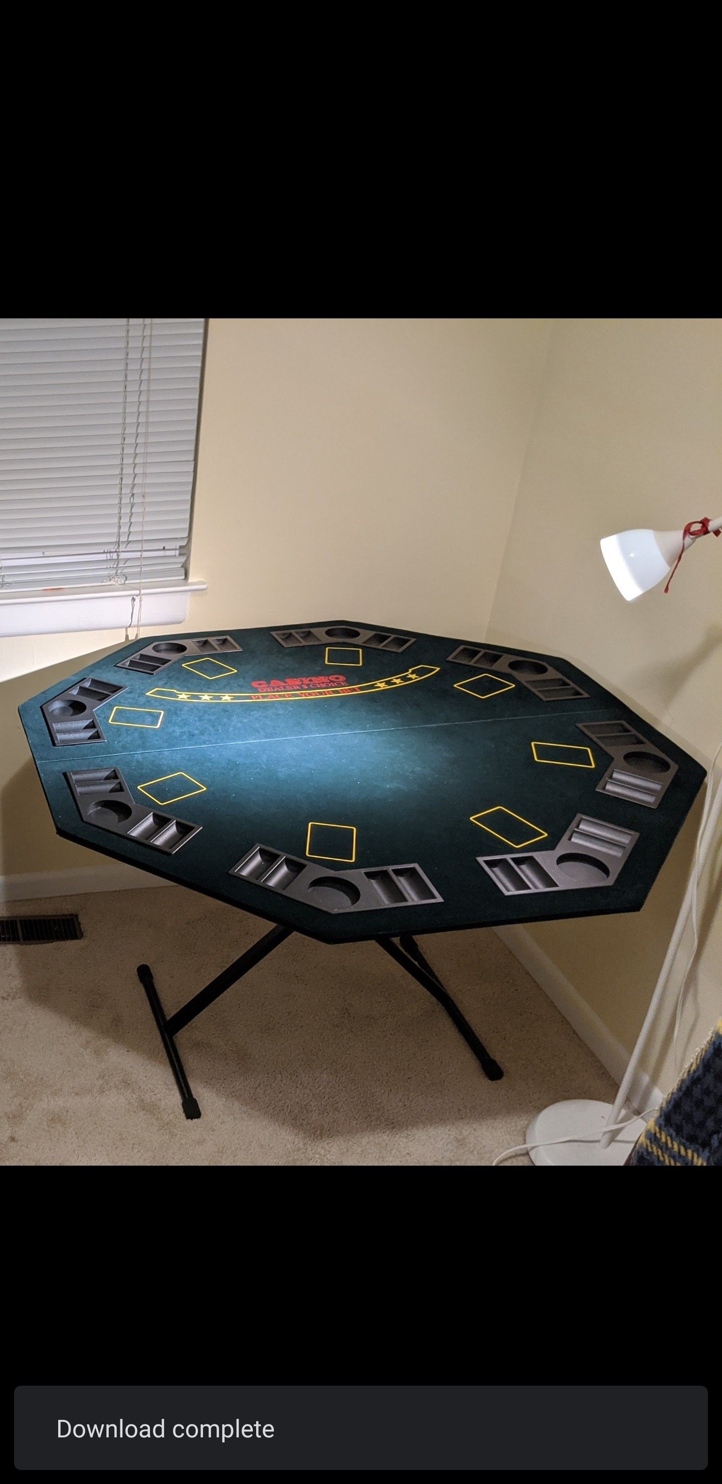 Poker table top and chips in suitcase