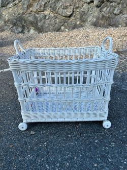 Vintage Rolling Wicker utility basket