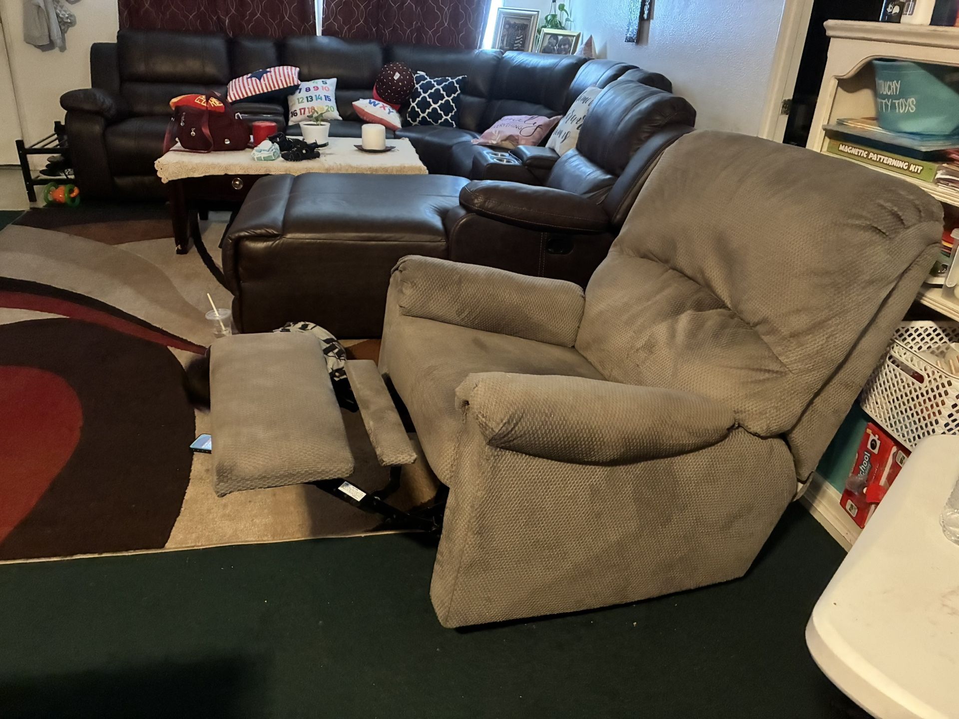 🥰🥰$$170-rocker/swivel grey colored (used not new) recliner (absolutely everything works on it )comes from a doggie friendly non smoking non pest hom