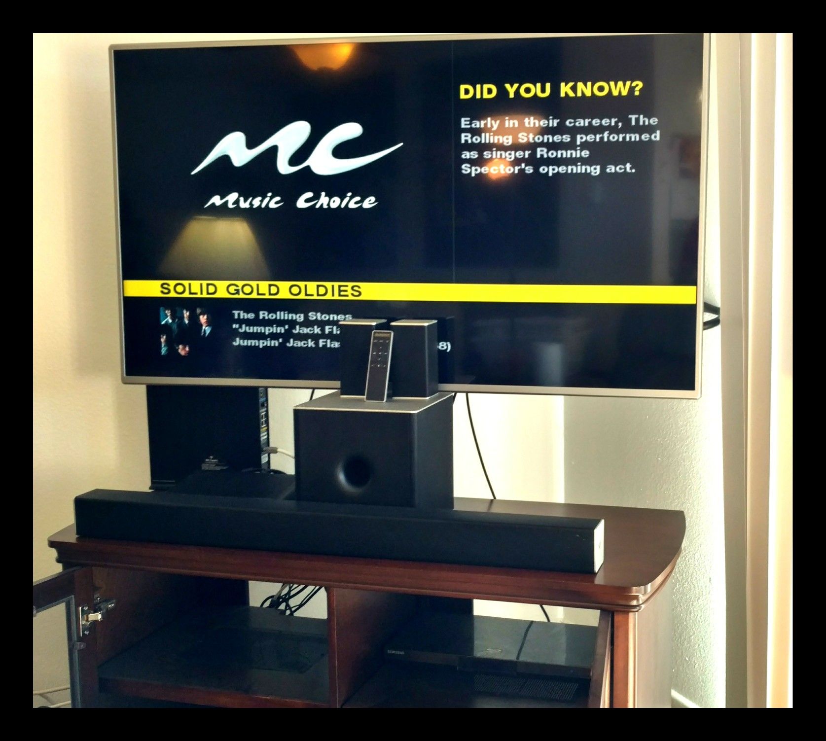 Samsung 47", Vizio sound bar w/speakers and Costco entertainment center