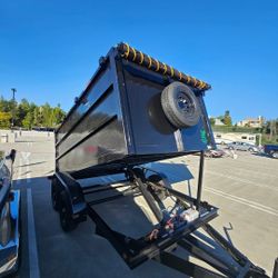 NEW DUMP TRAILERS 8X12X4 ROLLING TARP AND SPARE TIRE 2025 YEAR ELECTRIC BRAKES LIGHTS REMOTE CONTROL TITLE IN HAND READY FOR WORK FOR ANY QUESTION TEX